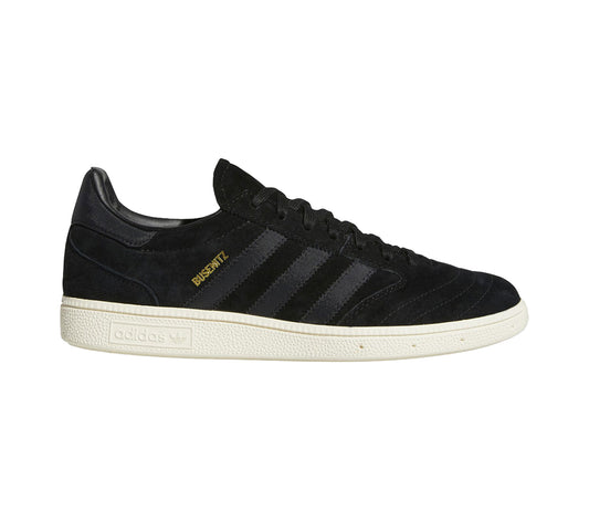 Adidas Busenitz Vintage. Low cut sneaker with black upper and white sole. gold Busenitz embroidery on outside of shoe.